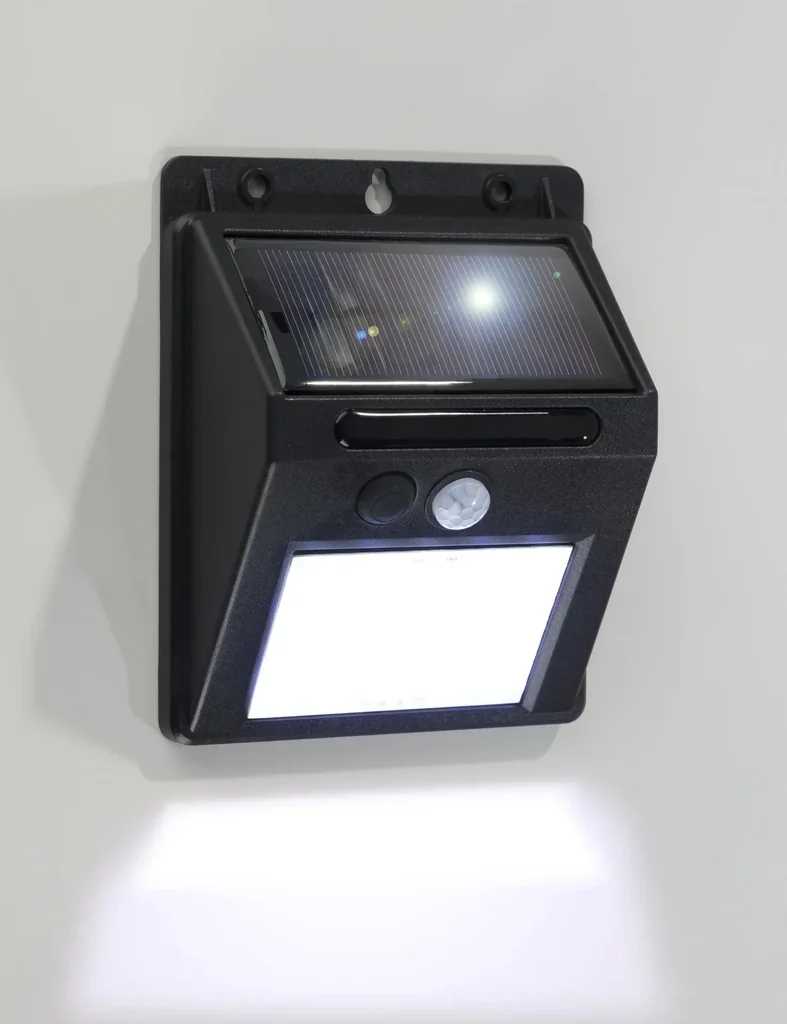 Solar wall light with infrared motion detector