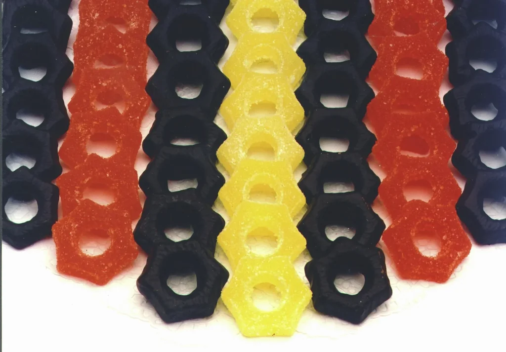 Pineapple and orange jelly stars, sugared/chocolated 1000g