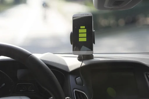 "Mobile phone holder with QI charging function - 2 in 1 image"