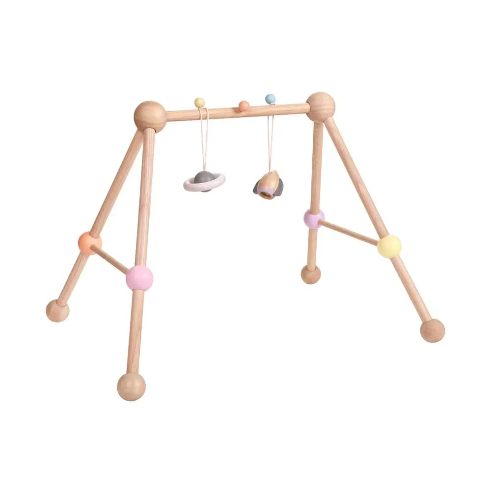 "Plan Toys Baby centrum gimnastyczne space drewno pastelowe image"