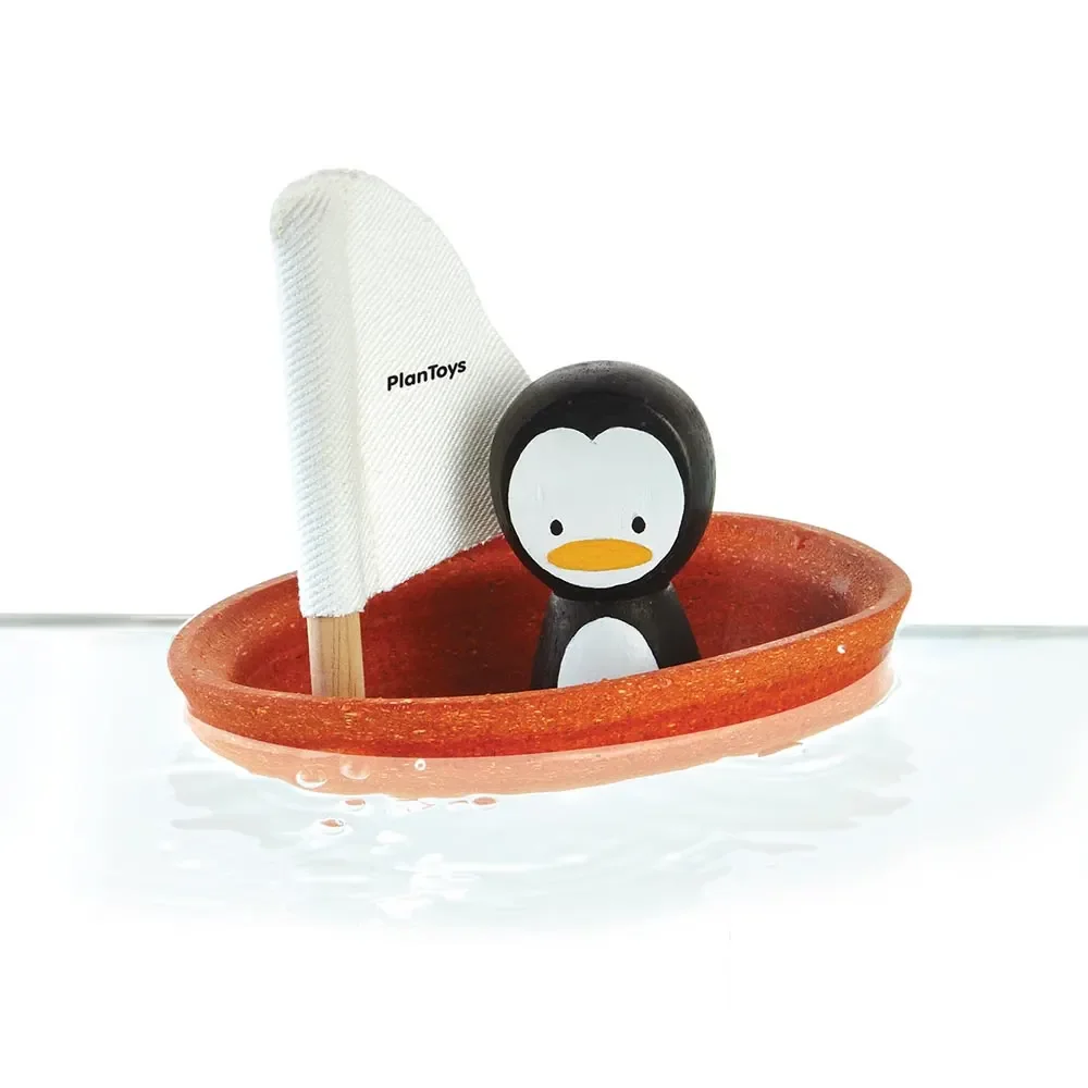 "Plan Toys Łódka do kąpieli pomarańczowy pingwin image"
