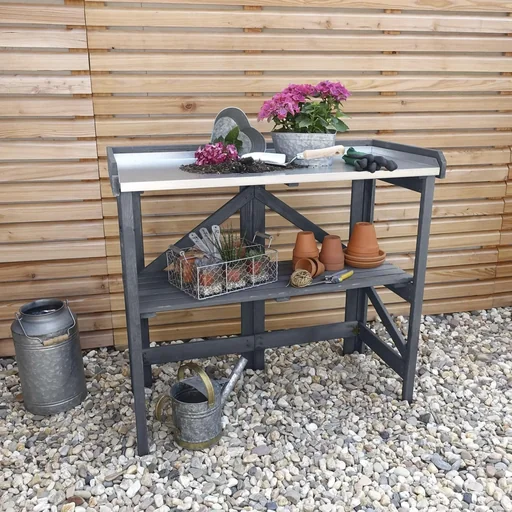 "Foldable planting table with galvanized work surface image"