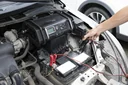 Battery charger with compressor